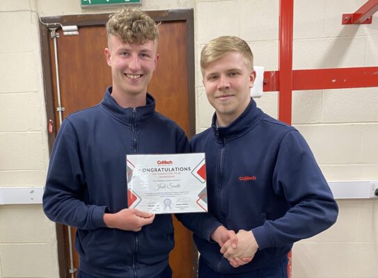 Employee receiving his certificate for completing his traineeship